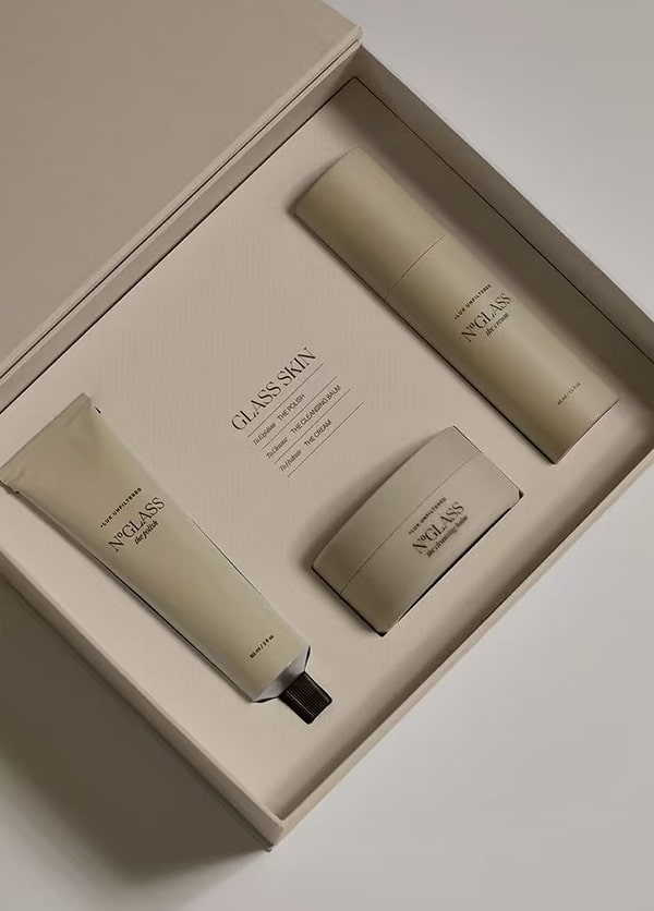 a cosmetic product box with printed paper insert