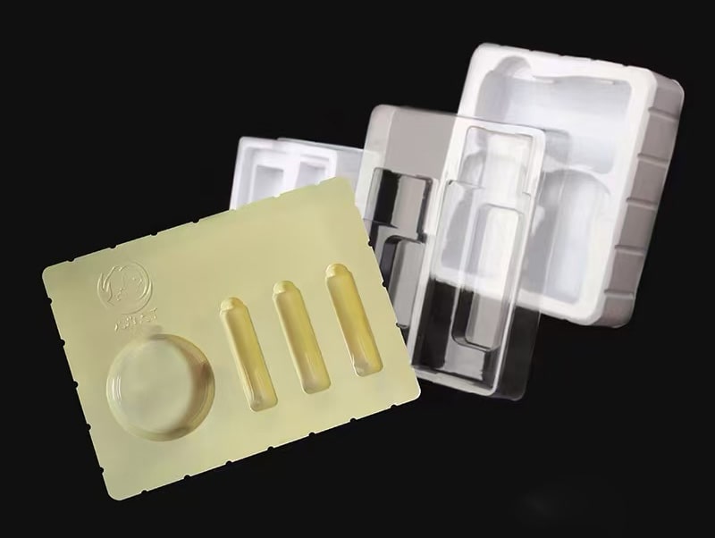 a photo shows different colors of plastic inserts